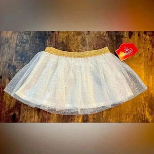 Holiday Time | baby girl holiday mesh skirt. Size: 12M